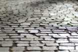 Pflastersteine_Weg eine gespfasterte Straßenfläche